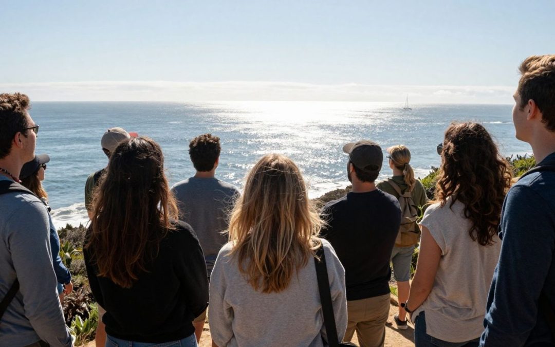 People looking towards California coast, symbolizing hope and new beginnings.